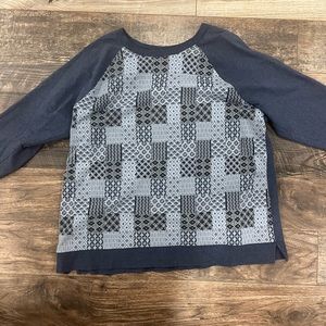 Thrifted blue sweatshirt! Super cool patterns on the front!